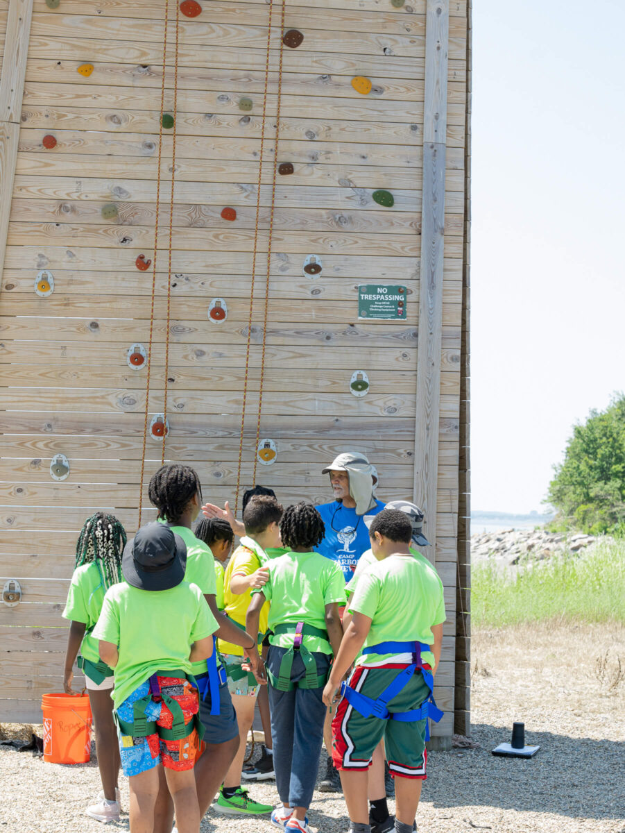 Campers getting ready to rock climb