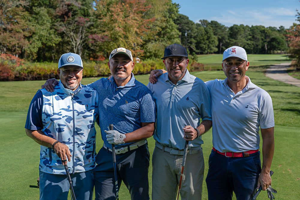 Four men play golf at the CHV Golf Classic.